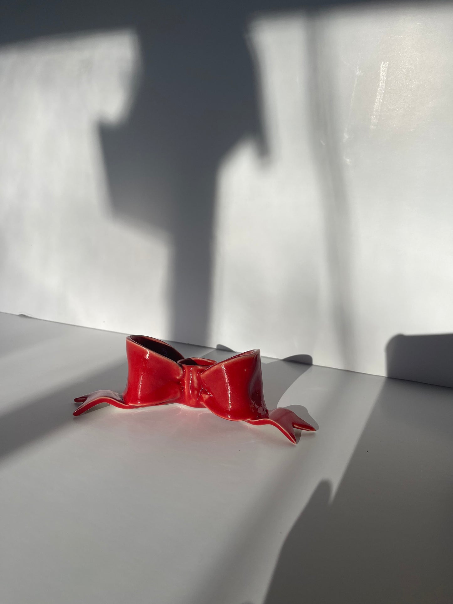 second red bow candlestick