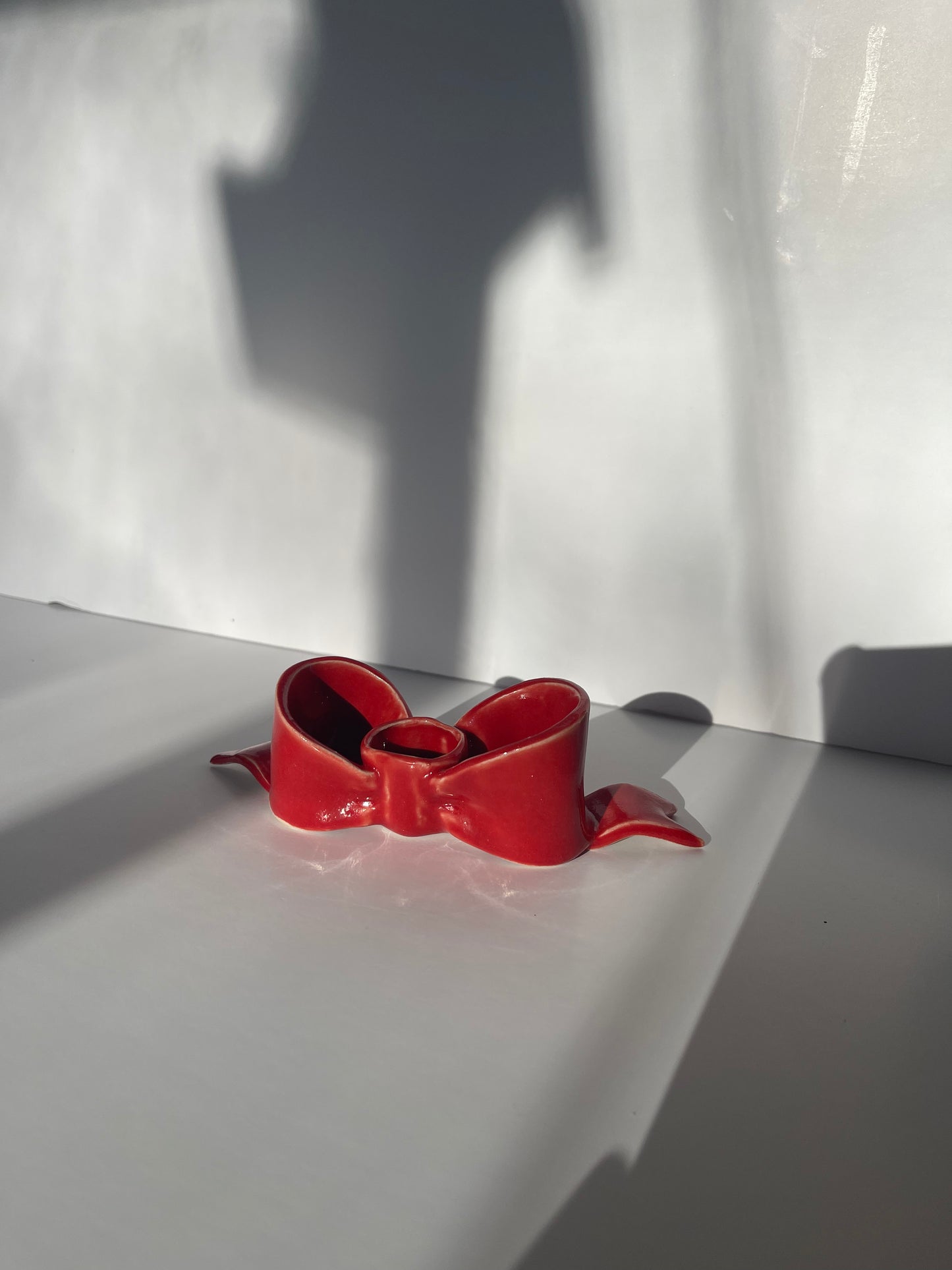 second red bow candlestick