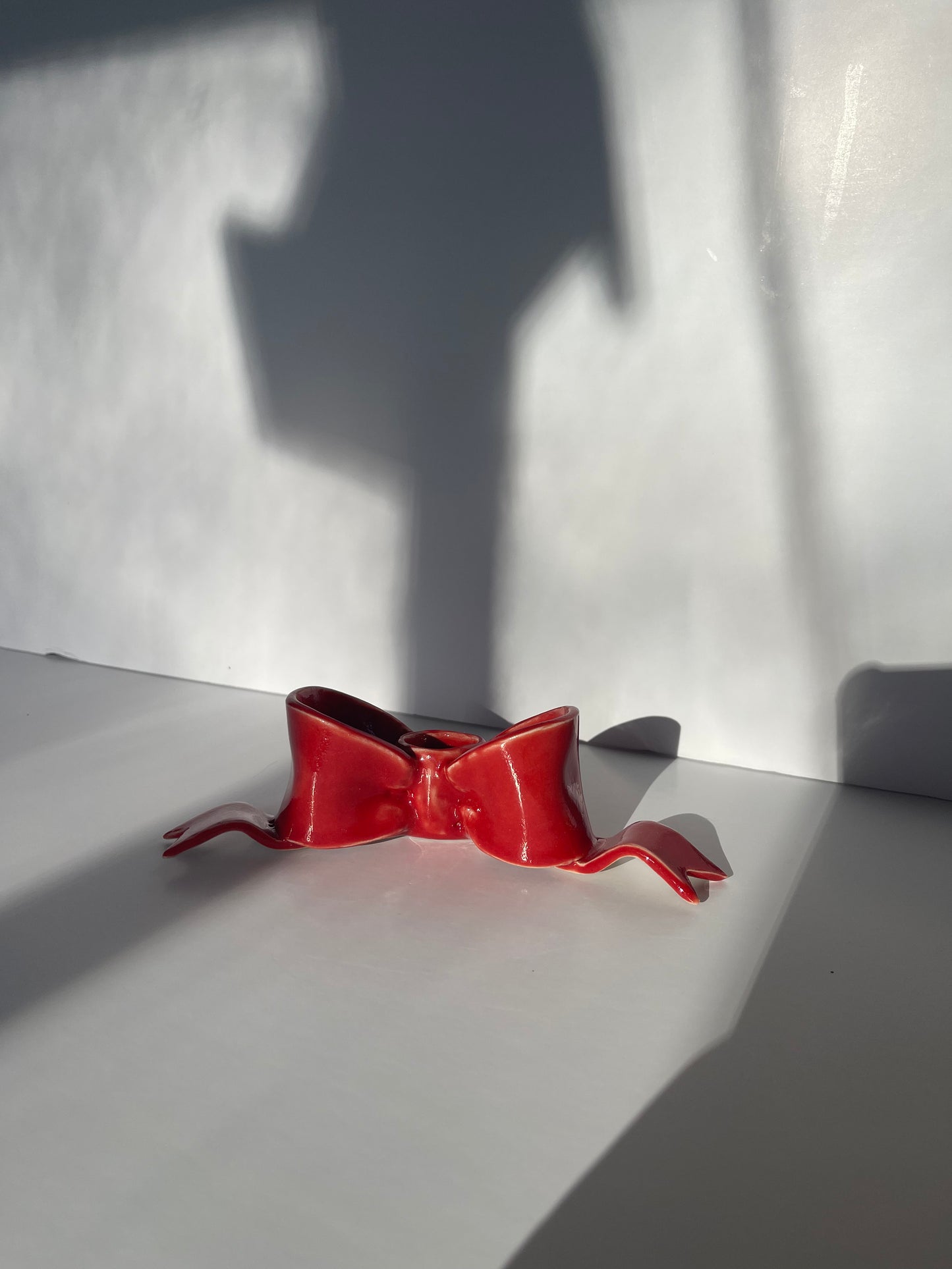 second red bow candlestick