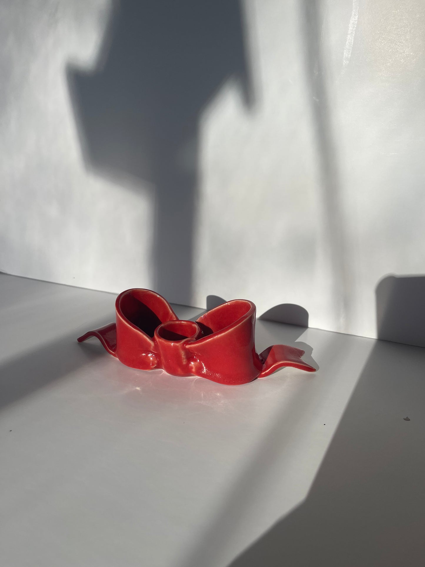 second red bow candlestick