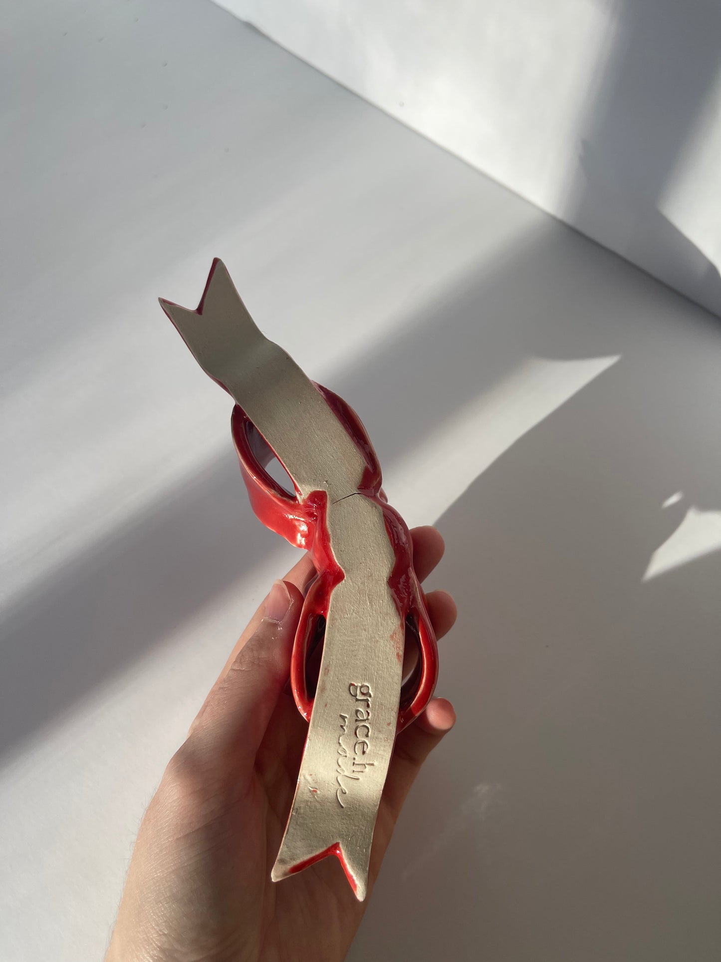 second red bow candlestick